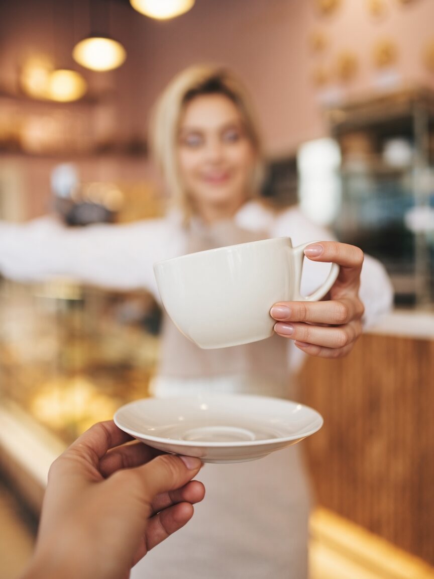 hand holding mug mockup free
