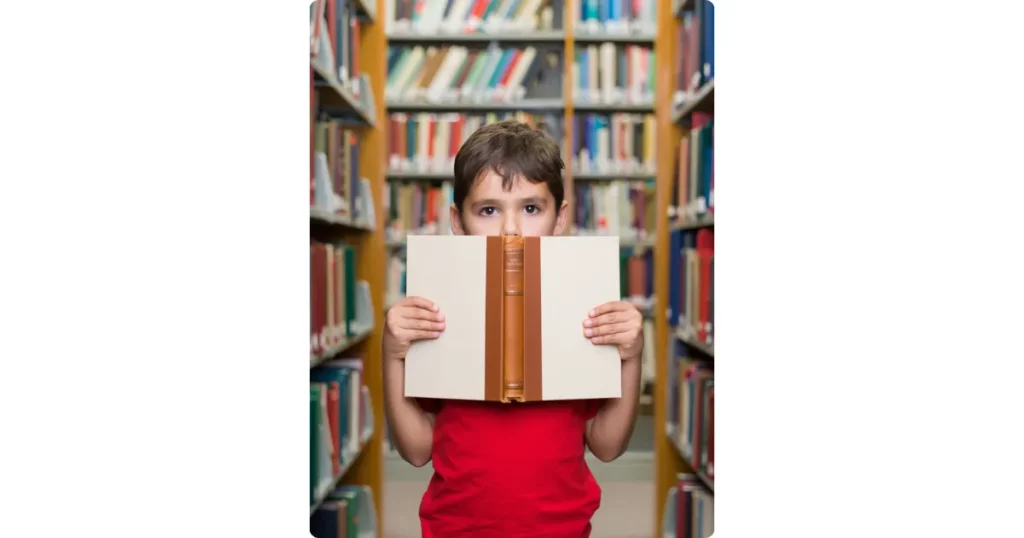 child holding a open book