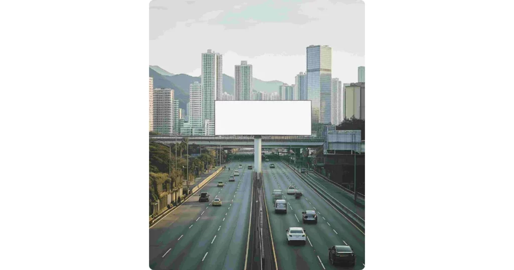 a billboard in a busy highway